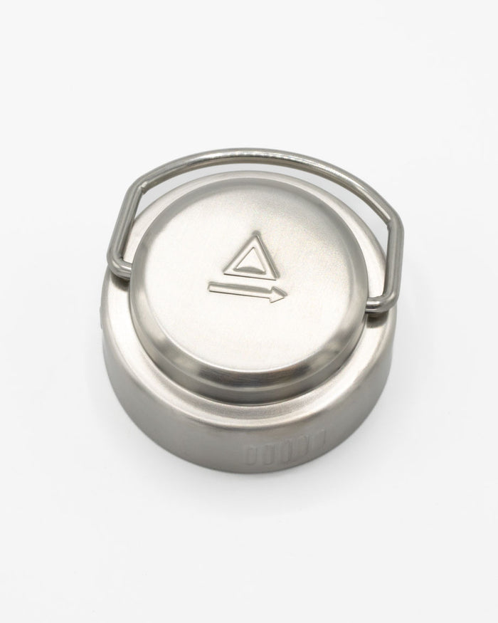 A Desert Moon 18 oz Steel Bottle with a Cognitive Surplus triangle on it.