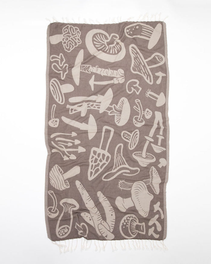 A brown Edible & Poisonous Mushrooms Turkish Towel with a mushroom design on it by Cognitive Surplus.