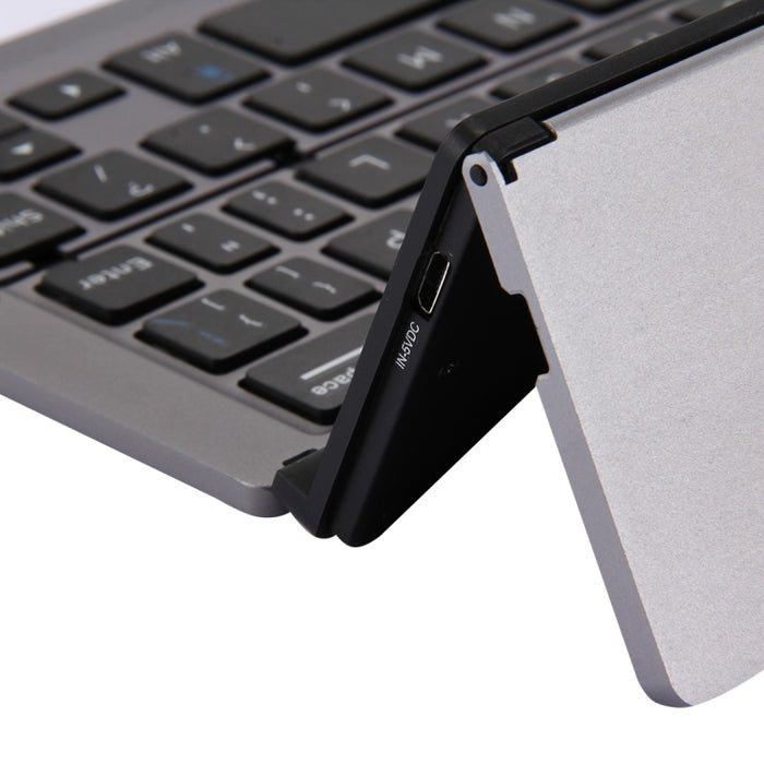F18 Ultra-Slim Bluetooth Wireless Keyboard - Rechargeable Foldable 58 Keys with Holder