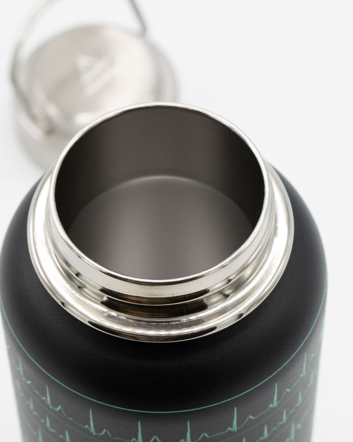 A Heartbeat 32 oz Steel Bottle with an ecg on it.