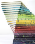 A stack of Cognitive Surplus Hypothesis Mystery Notebook 6-packs on top of each other.