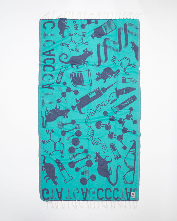 A blue and black Lab Science Turkish Towel with a lot of different things on it, Cognitive Surplus.