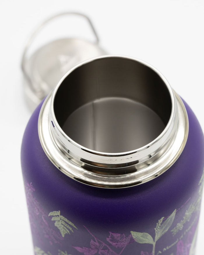 A Poisonous Plants 32 oz Steel Bottle with a silver lid by Cognitive Surplus.