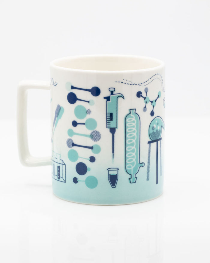 A Retro Laboratory 11 oz Ceramic Mug with a blue and white design on it by Cognitive Surplus.