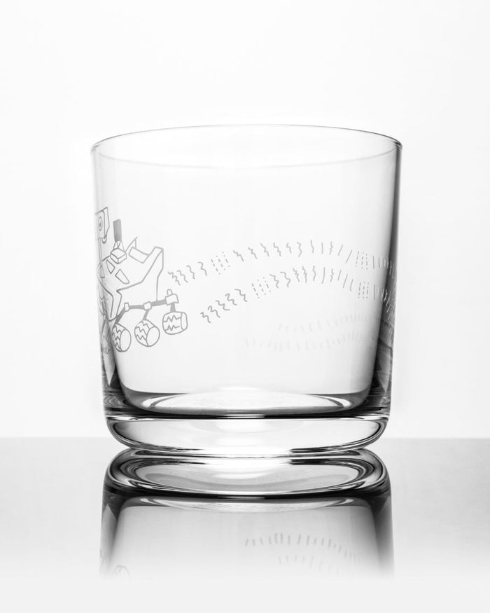 A SECONDS: Mars Rover Perseverance Whiskey Glass with a drawing of a horse on it, made by Cognitive Surplus.